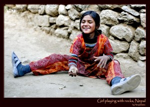 Nepali girl playing with rocks, Khumbu Valley