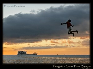 Flying kid in Stone Town, Zanzibar. (c) Harry Kikstra, ExposedPlanet.com Flying kid in Stone Town, Zanzibar. (c) Harry Kikstra, ExposedPlanet.com