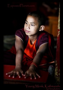 Young monk in Nepal waiting for his turn to bang the drum. (c) Harry Kikstra, ExposedPlanet.com Young monk in Nepal waiting for his turn to bang the drum. (c) Harry Kikstra, ExposedPlanet.com